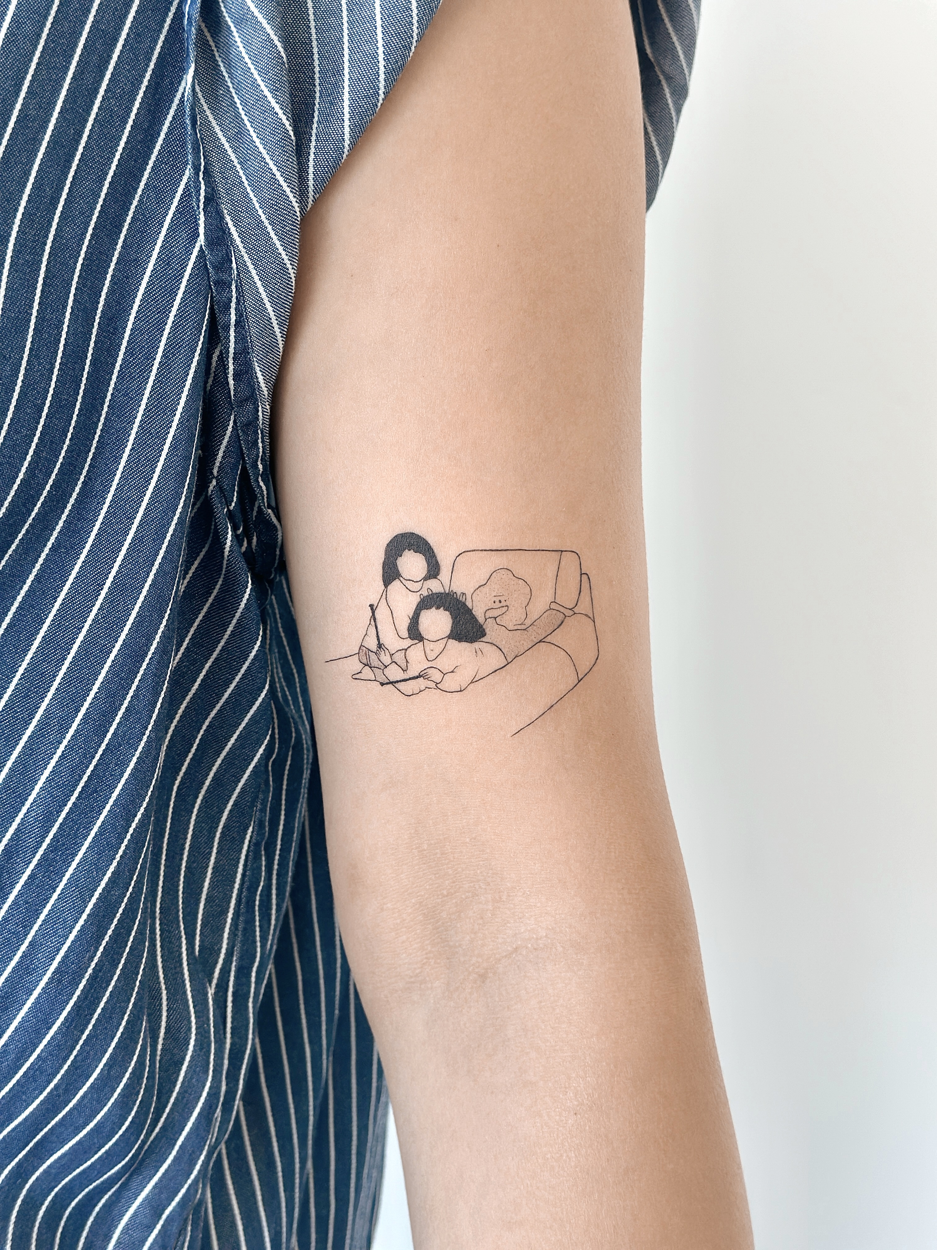 Custom fine line family illustration tattoo