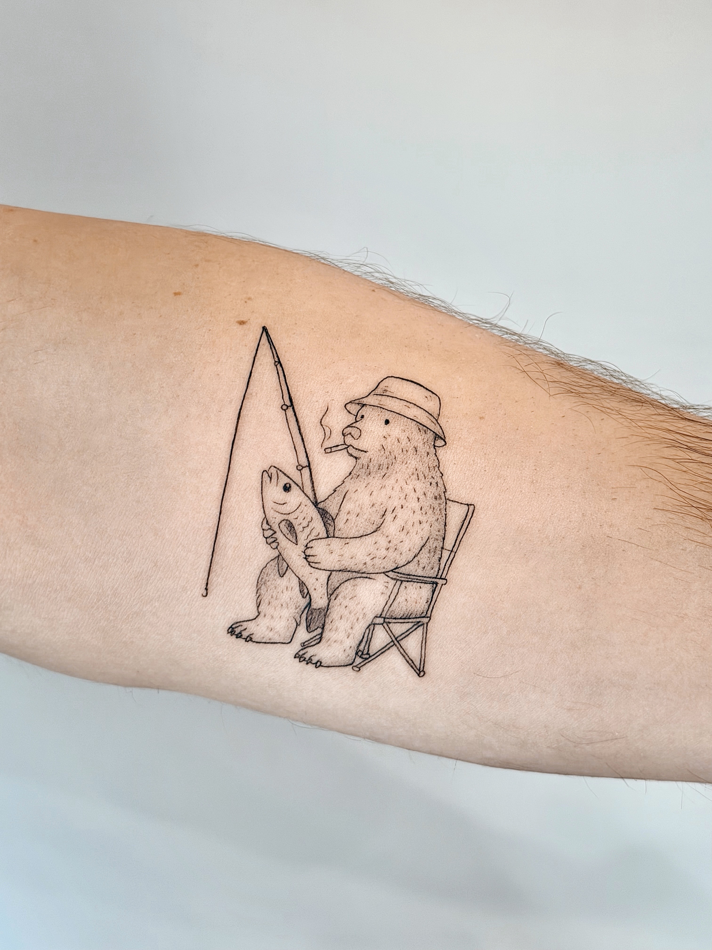 Fine line teddy bear illustration tattoo